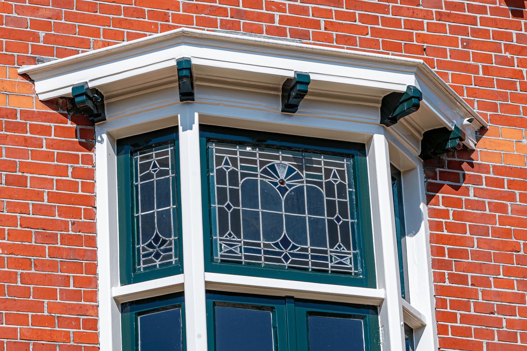 Erker bovenkant met consoles